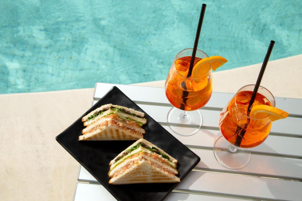 El Faro Hotel & Spa Alghero Bagian luar foto
